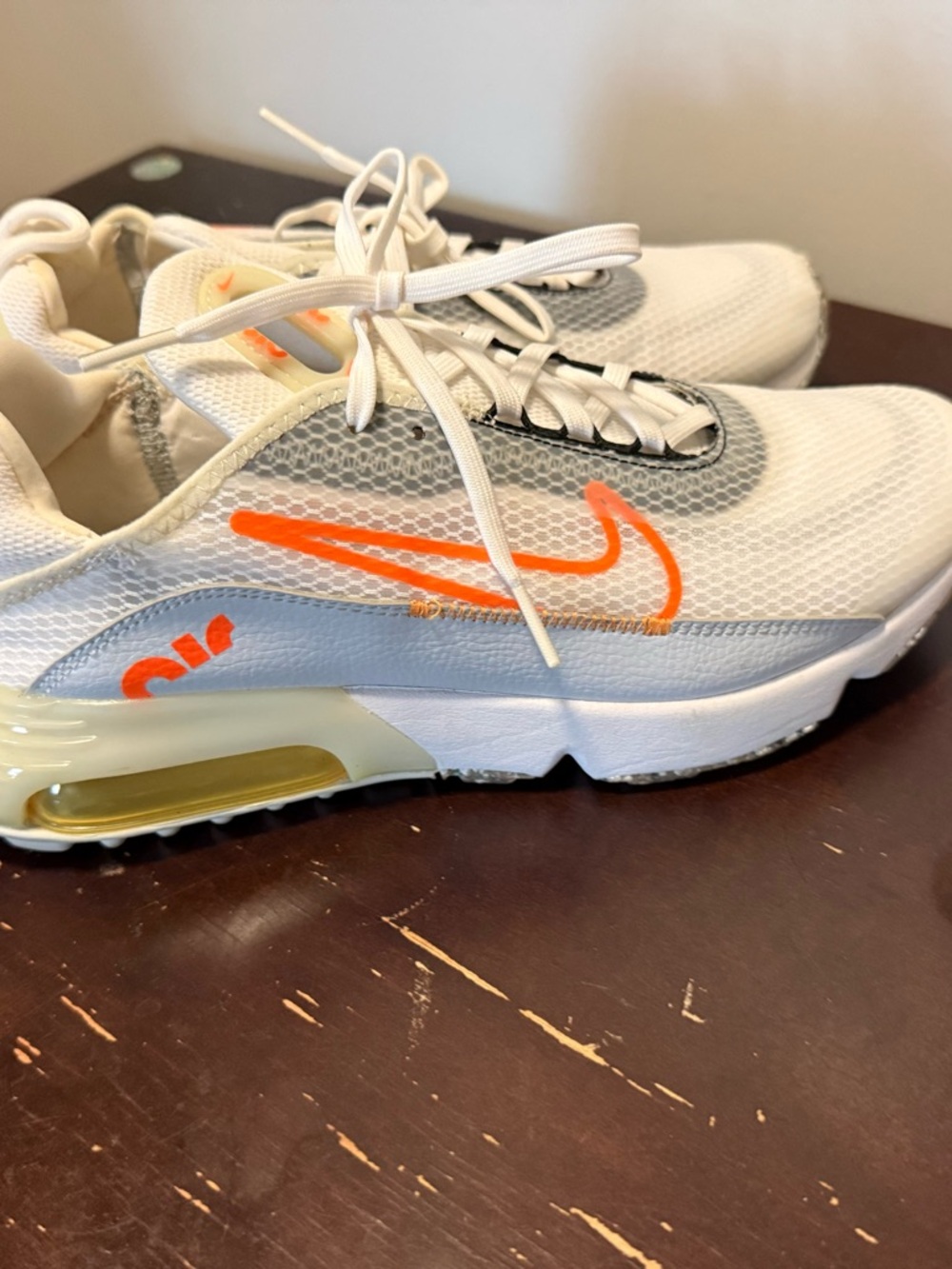 Nike White Mesh Sneakers with Bright Orange Swoosh